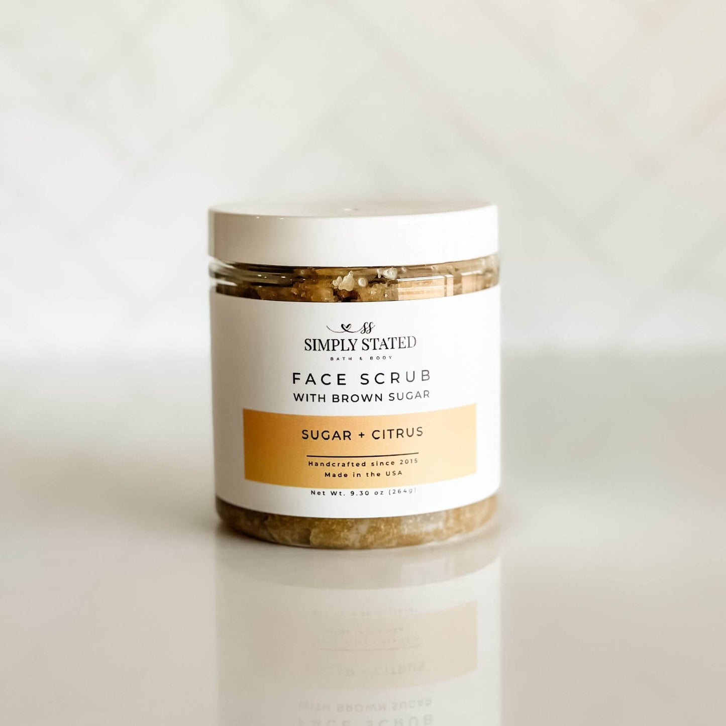 Zit Zapper Face Scrub – Sugar + Citrus exfoliating scrub for face care. Handcrafted with brown sugar, coconut oil, and vitamin E for gentle yet effective exfoliation.