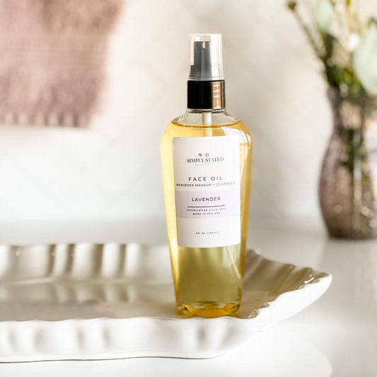 Face Oil by Simply Stated Bath & Body, a natural oil cleanser and makeup remover with lavender essential oil. Cleanses, hydrates, and soothes skin for a radiant glow.