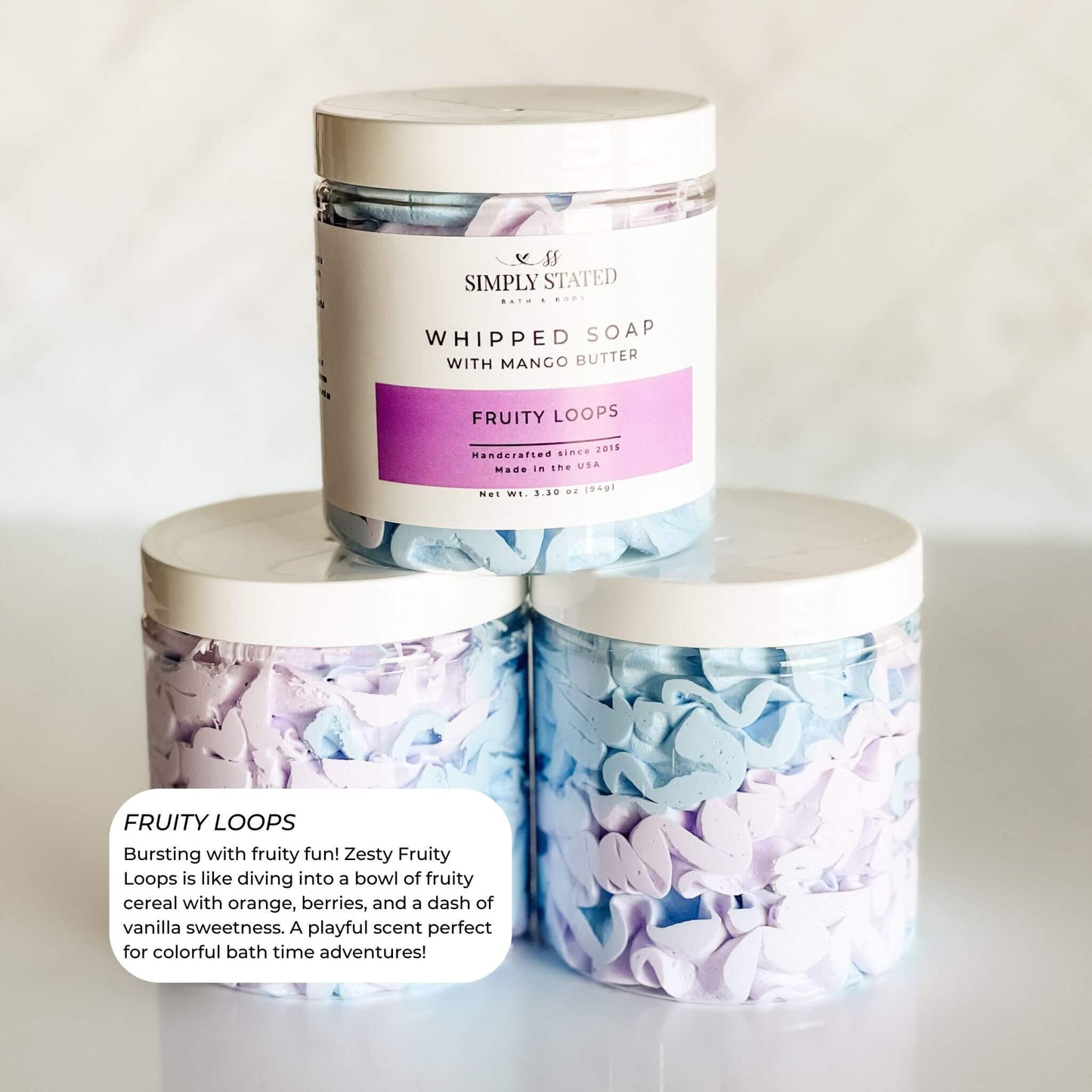 Simply Stated Bath & Body Fruity Loops Whipped Soap for kids. Bursting with vibrant colors and a playful fruity cereal scent, this whipped soap creates a fun and colorful bath time experience. Made with mango butter for soft, nourished skin.