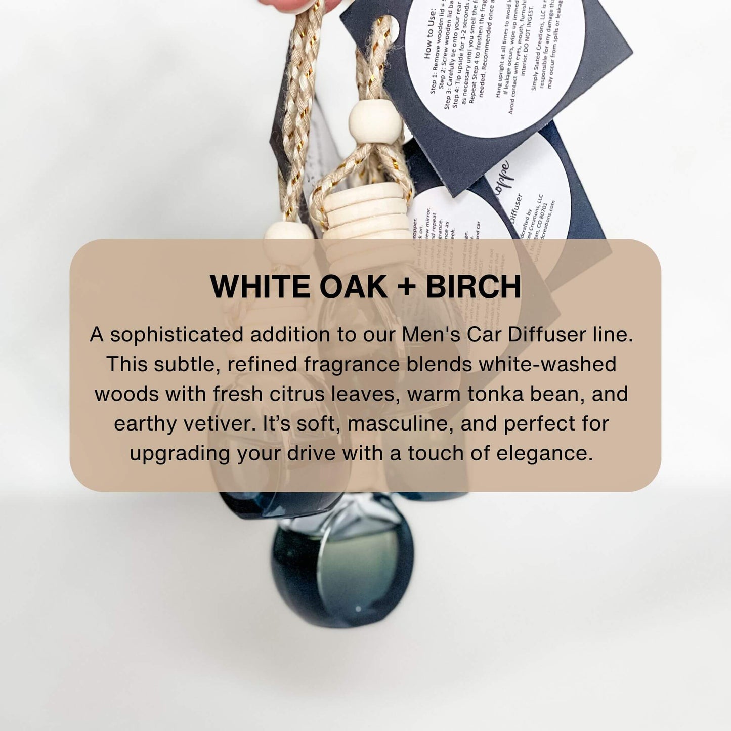 Close-up of White Oak + Birch car diffuser with hang cord and modern packaging