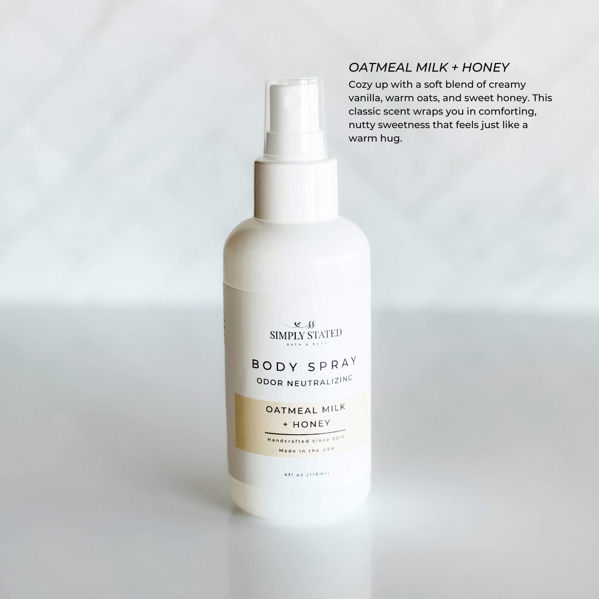 Simply Stated Oatmeal Milk + Honey Body Spray in a 4oz white bottle with odor-neutralizing formula. A warm, comforting scent of creamy vanilla, sweet honey, and oats.