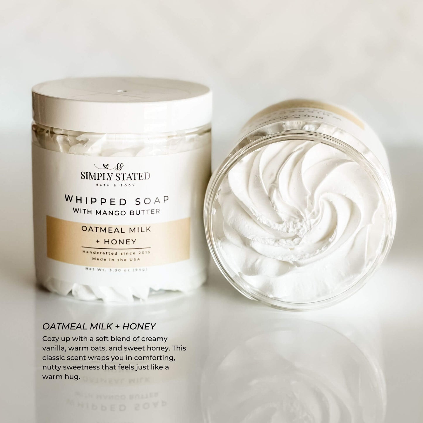 Signature Line Whipped Soap Oatmeal Milk + Honey, 8oz jar, a comforting blend of creamy vanilla, warm oats, and sweet honey, infused with mango butter for a rich and moisturizing experience.